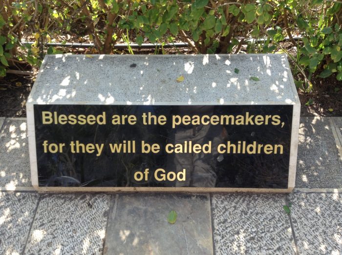 One of the stone pathway markers at the Roman Catholic Church in Israel where many believe Jesus gave the sermon that included the Beatitudes.