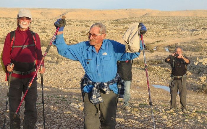 Trip leader Shuka Revak, 86, fulfills a life-long dream as he reaches Avdat in Israel from Jordan's Petra, February 2018. (courtesy of The Times of Israel)
