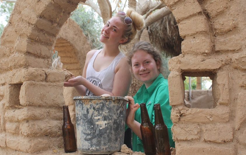 Volunteers in the natural construction on Kibbutz Lotan.