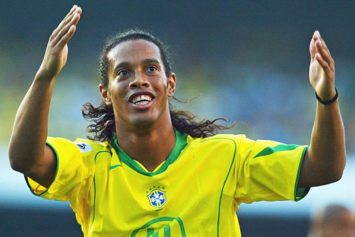 Ronaldinho celebrates after scoring a goal. (Photo: Mauricio Lima / AFP/Getty Images)