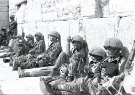 IDF Paratroopers relax after liberating the Western Wall during the Six Day War (Jpost.com)